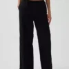 Pantalones holgados de popelín de talle medio y pierna ancha
