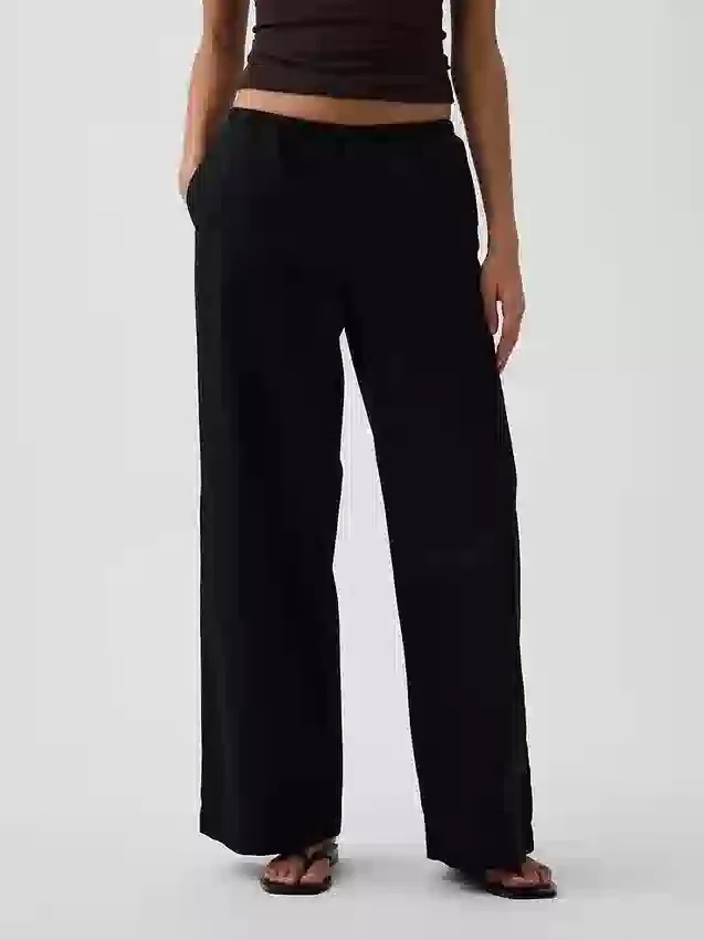 Pantalones holgados de popelín de talle medio y pierna ancha