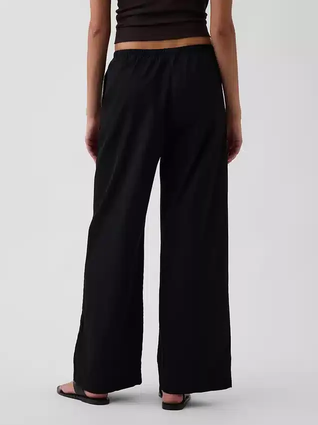 Pantalones holgados de popelín de talle medio y pierna ancha