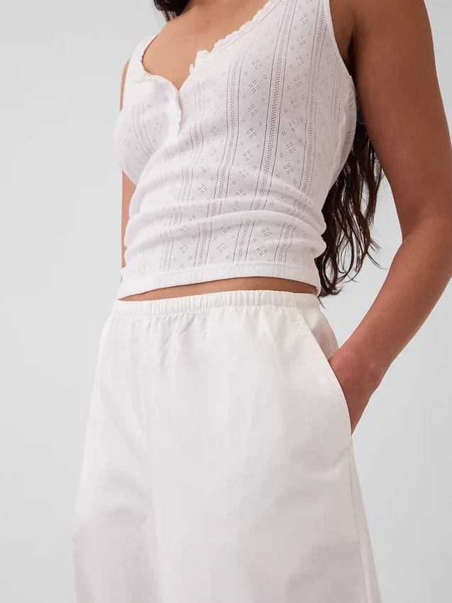 Pantalones holgados de popelín de talle medio y pierna ancha