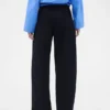 Pantalones plisados de talle alto con corte en arco de GAP × Victoria Beckham