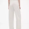 Pantalones plisados de talle alto con corte en arco de GAP × Victoria Beckham