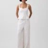Partes de arriba con peplum de mezcla de lino
