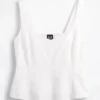 Partes de arriba con peplum de mezcla de lino
