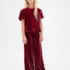 Partes de arriba de terciopelo con peplum para niños