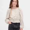 Partes de arriba infantiles con peplum arrugado