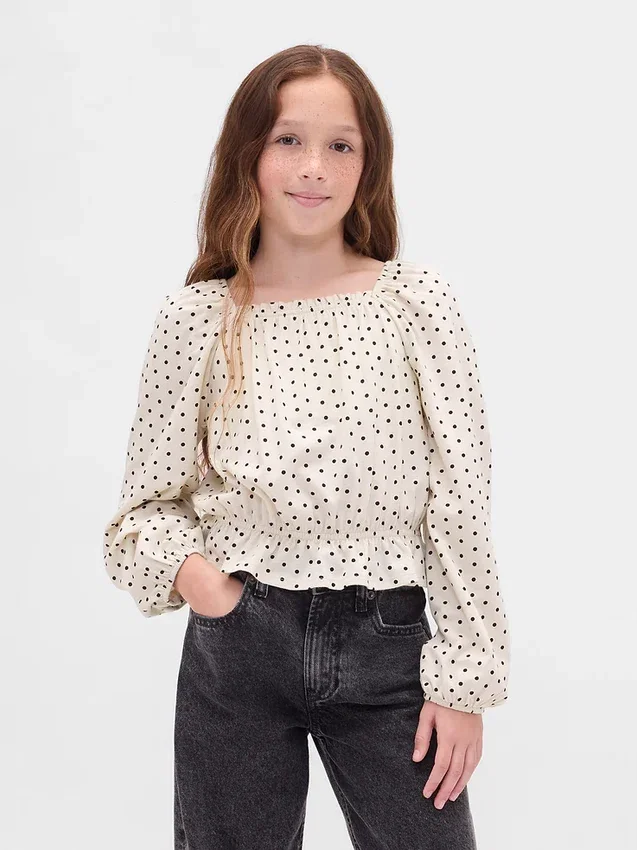 Partes de arriba infantiles con peplum arrugado