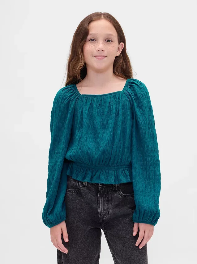 Partes de arriba infantiles con peplum arrugado