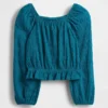 Partes de arriba infantiles con peplum arrugado