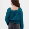 Partes de arriba infantiles con peplum arrugado