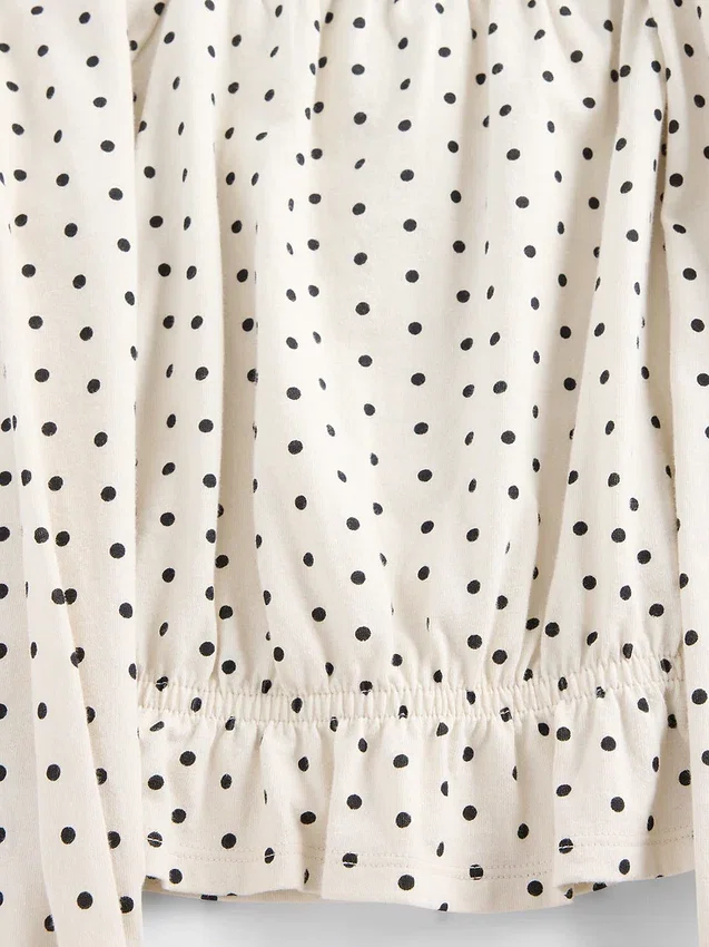 Partes de arriba infantiles con peplum arrugado