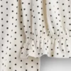 Partes de arriba infantiles con peplum arrugado
