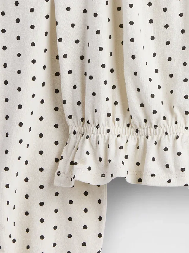 Partes de arriba infantiles con peplum arrugado