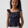 Partes de arriba infantiles con peplum, mangas con volantes y fruncido