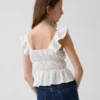 Partes de arriba infantiles con peplum, mangas con volantes y fruncido