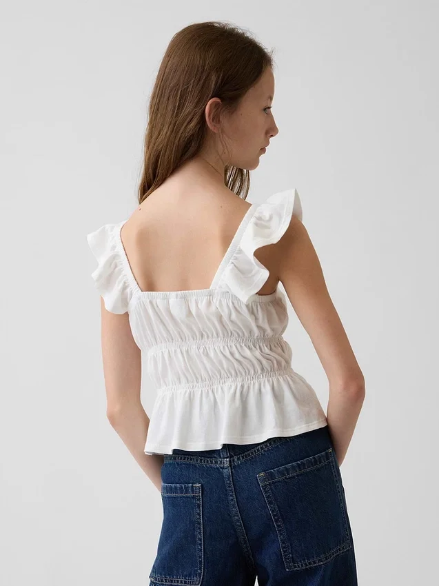Partes de arriba infantiles con peplum, mangas con volantes y fruncido