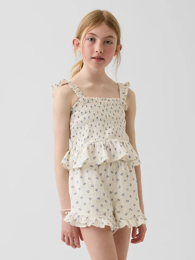 Partes de arriba infantiles de gasa de algodón con peplum fruncido