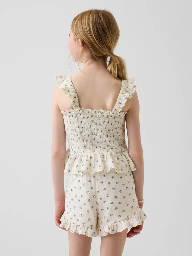 Partes de arriba infantiles de gasa de algodón con peplum fruncido