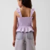 Partes de arriba infantiles de gasa de algodón con peplum fruncido