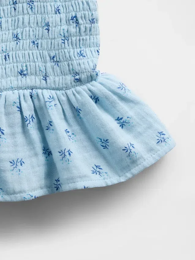 Partes de arriba infantiles de gasa de algodón con peplum fruncido