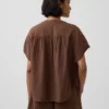 Partes de arriba oversize de gasa de algodón con cuello abierto