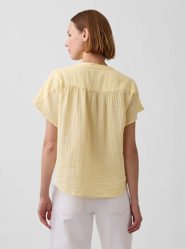 Partes de arriba oversize de gasa de algodón con cuello abierto