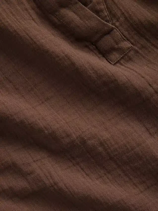 Partes de arriba oversize de gasa de algodón con cuello abierto