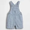 Peto corto de denim a cuadros vichy con bolsillo de osito para bebé