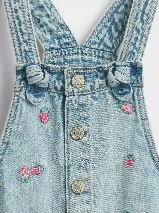 Peto corto de denim bordado para bebés y niños