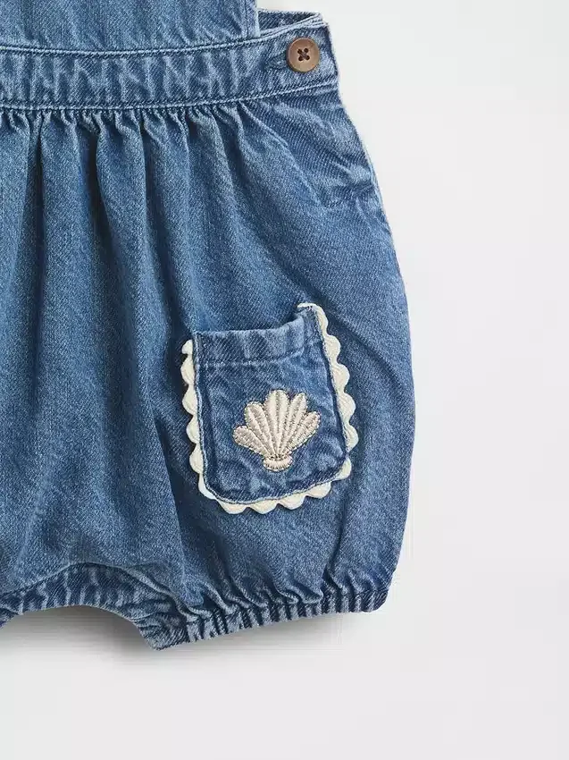 Peto tipo burbuja de denim para bebé con bolsillos de parche
