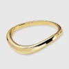 Pulsera tipo brazalete de oro de Ana Luisa Talia