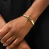 Pulsera tipo brazalete de oro de Ana Luisa Talia