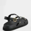 Sandalias de niño con talón abierto y tachuelas
