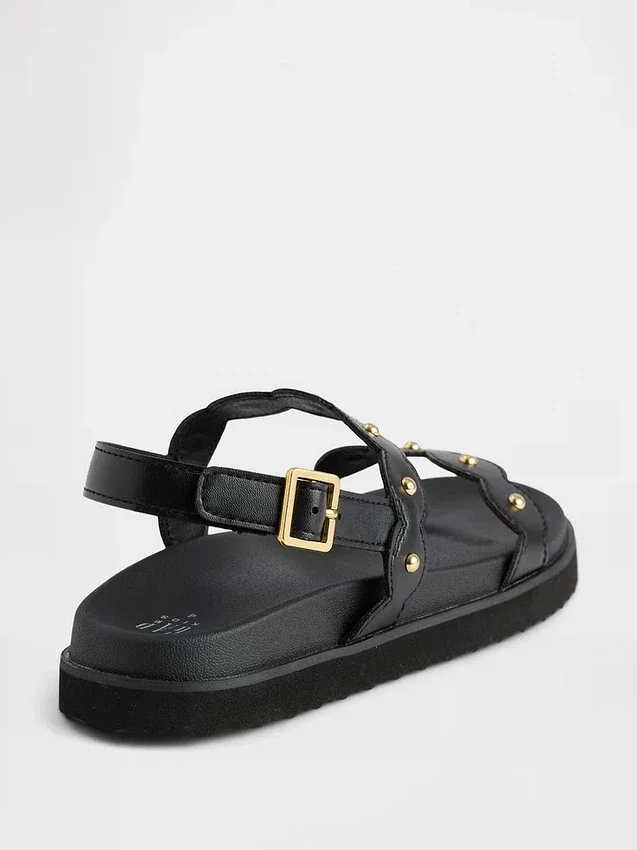 Sandalias de niño con talón abierto y tachuelas