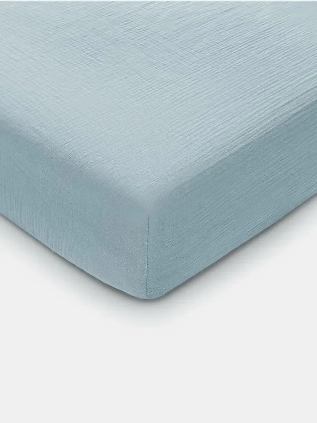 Sábana bajera ajustable de muselina de Comfy Cubs