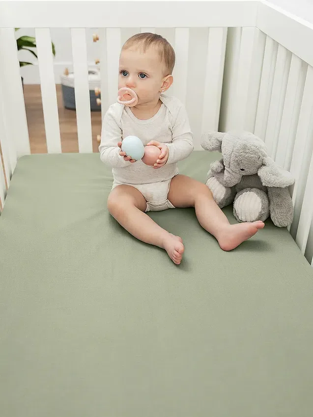 Sábana bajera ajustable de muselina de Comfy Cubs