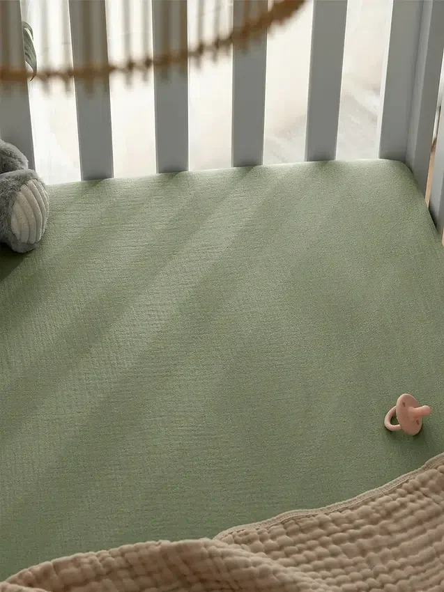 Sábana bajera ajustable de muselina de Comfy Cubs