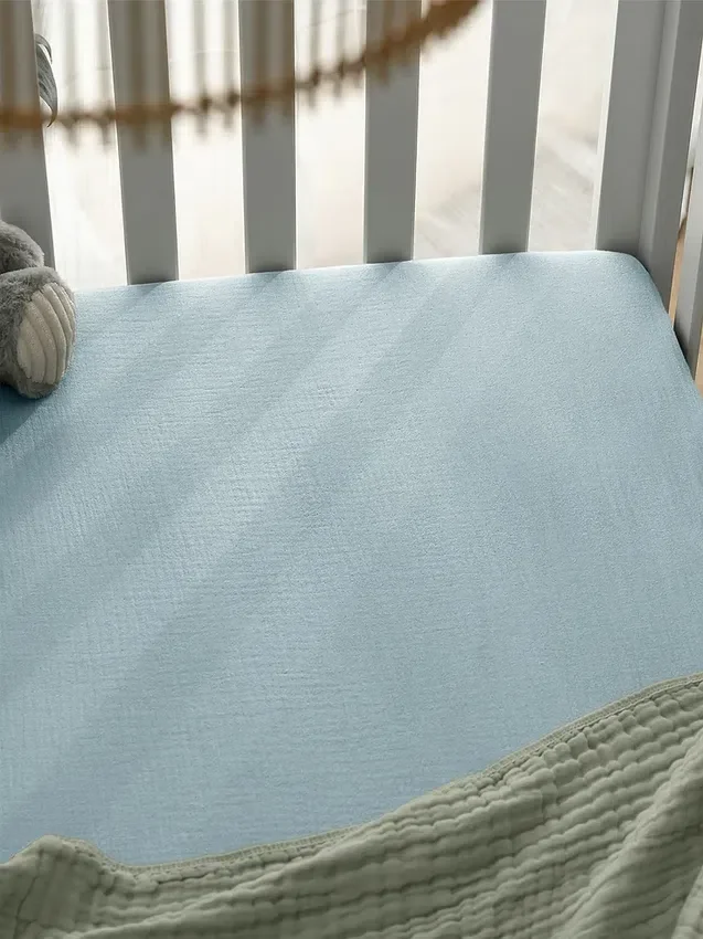 Sábana bajera ajustable de muselina de Comfy Cubs