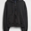 Sudadera con capucha, cremallera completa y corte corto oversize para adulto