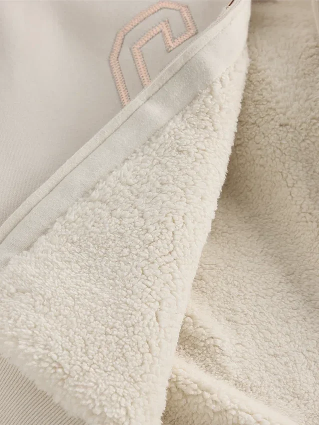 Sudadera con capucha para niños con logotipo gráfico y forro de sherpa