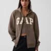 Sudadera con capucha y cremallera para adulto «Vintagesoft Arch Logo»