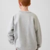 Sudadera infantil Vintagesoft de corte holgado con cuello redondo y bolsillo