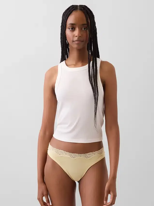 Tanga de algodón orgánico elástico con ribete de encaje