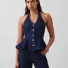 Top ajustado de denim con cuello halter y peplum