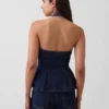 Top ajustado de denim con cuello halter y peplum