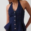 Top ajustado de denim con cuello halter y peplum