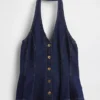 Top ajustado de denim con cuello halter y peplum