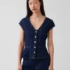 Top ajustado de denim con mangas casquillo y peplum