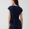 Top ajustado de denim con mangas casquillo y peplum