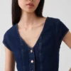 Top ajustado de denim con mangas casquillo y peplum